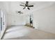 Spacious living room with recessed lights, ceiling fans and access to other rooms at 7780 Osceola St, Westminster, CO 80030