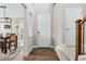 Bright entryway with wood floors, complemented by an adjacent dining area at 376 Dallas St, Denver, CO 80230