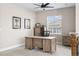 Second floor home office with a large window and a ceiling fan at 376 Dallas St, Denver, CO 80230