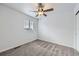 Bedroom with ceiling fan and neutral carpeting at 17189 E 103Rd Pl, Commerce City, CO 80022