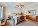 A comfortable bedroom with vaulted ceiling, dresser and carpet at 1104 Rumbling Sky Pl, Castle Rock, CO 80108