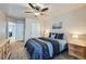 Comfortable bedroom featuring a ceiling fan, carpet floors, and a closet at 1104 Rumbling Sky Pl, Castle Rock, CO 80108