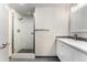 Modern bathroom with a glass-enclosed shower, sleek vanity, and contemporary finishes at 6495 E Happy Canyon Rd # 158, Denver, CO 80237