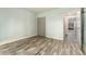 This bedroom features wood floors and a sliding door closet, offering practical storage solutions at 6495 E Happy Canyon Rd # 158, Denver, CO 80237