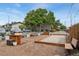 Community outdoor space with bocce ball court, benches, and picnic tables at 6495 E Happy Canyon Rd # 158, Denver, CO 80237