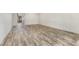 Open-concept living area with sleek flooring, seamlessly connecting to other living spaces at 6495 E Happy Canyon Rd # 158, Denver, CO 80237