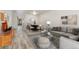 Spacious open-concept living and dining area with stylish furnishings and ample natural light at 6495 E Happy Canyon Rd # 158, Denver, CO 80237