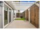 This patio features a pergola, privacy fence and small section of artificial turf at 6495 E Happy Canyon Rd # 158, Denver, CO 80237