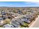 Neighborhood aerial view showing the home's position among neighboring houses and community landscape at 8827 Cloverleaf Cir, Parker, CO 80134