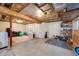 Unfinished basement featuring exposed beams and ample space for storage or customization at 8827 Cloverleaf Cir, Parker, CO 80134