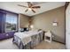 Comfortable bedroom offers carpet, a ceiling fan, and is the perfect relaxing space at 8827 Cloverleaf Cir, Parker, CO 80134