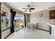 Cozy breakfast nook with backyard view and sliding glass door access to the outdoor area at 8827 Cloverleaf Cir, Parker, CO 80134
