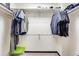 Organized walk-in closet with ample storage space for clothes and accessories at 8827 Cloverleaf Cir, Parker, CO 80134