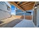 Covered patio extends from home into backyard, offering additional outdoor space at 16130 E 111Th Dr, Commerce City, CO 80022