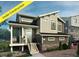 Modern two-story home with attached garage and deck at 16130 E 111Th Dr, Commerce City, CO 80022