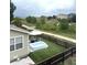 Backyard oasis featuring a fence, in-ground pool, and patio furniture at 7883 S Kalispell Cir, Englewood, CO 80112