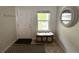 Bright entryway with storage bench and neutral decor at 7883 S Kalispell Cir, Englewood, CO 80112