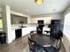 Updated kitchen with modern appliances and breakfast nook at 7883 S Kalispell Cir, Englewood, CO 80112