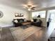 Spacious living room featuring hardwood floors and comfortable seating at 7883 S Kalispell Cir, Englewood, CO 80112