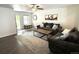 Inviting living room with ample seating and natural light at 7883 S Kalispell Cir, Englewood, CO 80112