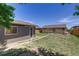 Exterior showing one car garage with access to backyard at 3685 Jasmine St, Denver, CO 80207
