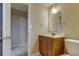 Bathroom has updated vanity and mirror and includes a linen closet at 3685 Jasmine St, Denver, CO 80207