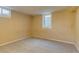 Bedroom with a window and neutral carpet at 3685 Jasmine St, Denver, CO 80207