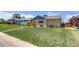 Quaint one-story home with a well-manicured lawn and mature landscaping at 3685 Jasmine St, Denver, CO 80207