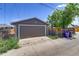 Exterior view of the single-car garage with alley access at 3685 Jasmine St, Denver, CO 80207