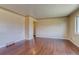 Spacious living room featuring hardwood floors and lots of natural light at 3685 Jasmine St, Denver, CO 80207