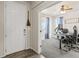 Inviting entryway leading to a cozy home office space with natural light and practical layout at 7018 E 123Rd Pl, Thornton, CO 80602
