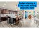 Bright kitchen with island seating, stainless appliances, granite counters, and a $10k rate reduction incentive at 7018 E 123Rd Pl, Thornton, CO 80602