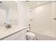 Bright bathroom with white tiles and a bathtub at 39836 Floyd St, Elizabeth, CO 80107