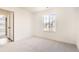 Bright bedroom with large window and soft carpet at 39836 Floyd St, Elizabeth, CO 80107