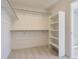 Bright walk-in closet with ample shelving and hanging space for organized storage at 39836 Floyd St, Elizabeth, CO 80107
