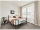 Bright bedroom with lots of natural light, a comfortable bed, and simple decor at 17614 Drake St, Broomfield, CO 80023