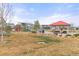 Delightful community playground featuring colorful play structures, picnic tables, and well-maintained landscaping at 17614 Drake St, Broomfield, CO 80023