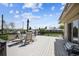 Outdoor deck area with ample seating, perfect for enjoying views and relaxation at 9508 Lou Dr, Northglenn, CO 80260