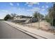 Fenced yard with landscaping and a two-level backyard offer privacy and space, set back from the road at 9508 Lou Dr, Northglenn, CO 80260