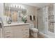 Updated bathroom with a walk-in shower and tiled flooring at 8471 Everett Way # A, Arvada, CO 80005