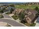 Aerial view showcasing the home's location with mountain views and landscaping at 22665 E Calhoun Pl, Aurora, CO 80016
