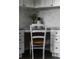 Charming office nook with a white marble backsplash and matching cabinetry at 22665 E Calhoun Pl, Aurora, CO 80016