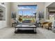 Spacious living room with large windows showcasing views of the neighborhood at 22665 E Calhoun Pl, Aurora, CO 80016