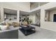 Open-concept living room seamlessly connects with the kitchen area at 22665 E Calhoun Pl, Aurora, CO 80016