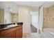 This bathroom has tile floors, granite countertop, white sink, and a walk-in shower at 975 N Lincoln St # 10A, Denver, CO 80203