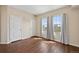 Bedroom with hardwood floors, natural light and two large closets at 975 N Lincoln St # 10A, Denver, CO 80203