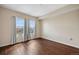 Bright bedroom with hardwood floors and views of the city at 975 N Lincoln St # 10A, Denver, CO 80203