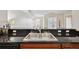 Modern kitchen area with stainless steel sink and expansive countertop space at 975 N Lincoln St # 10A, Denver, CO 80203