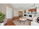 A cozy living room with modern furniture, complemented by an open view to the kitchen at 975 N Lincoln St # 10A, Denver, CO 80203