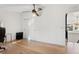 Bright bedroom with hardwood floors and vaulted ceiling featuring a closet at 1345 S Ivy Way, Denver, CO 80224